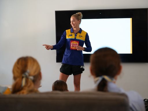 Charlie Thomas Blog post - St Hilda's Anglican School For Girls St Hilda's Athlete Development Program students listening to guest speaker Charlie Thomas