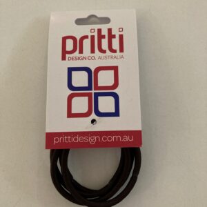Tag for Pritti Design Co. Australia with red 'pritti' text, blue and red square logo, and bundled brown cords