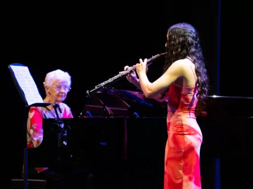 Senior flute soloist accompanied by pianist during recital at a best private high schools in Perth