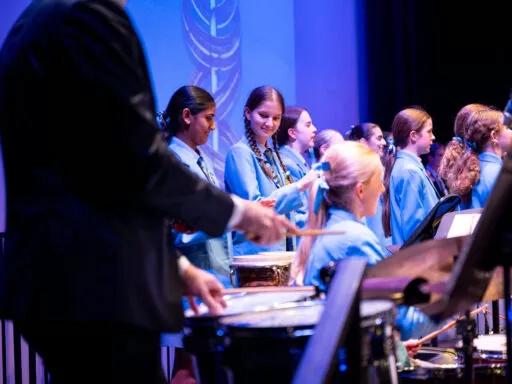 Percussionists performing in concert band during school music showcase at an Anglican Perth high school